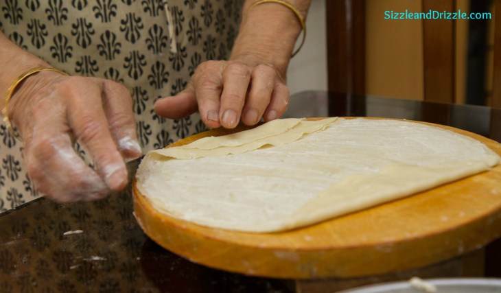 After stacking 3 on top of each other, start folding it from the sides