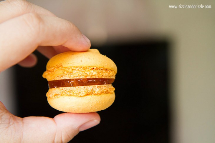 Mango Macaron held in hand